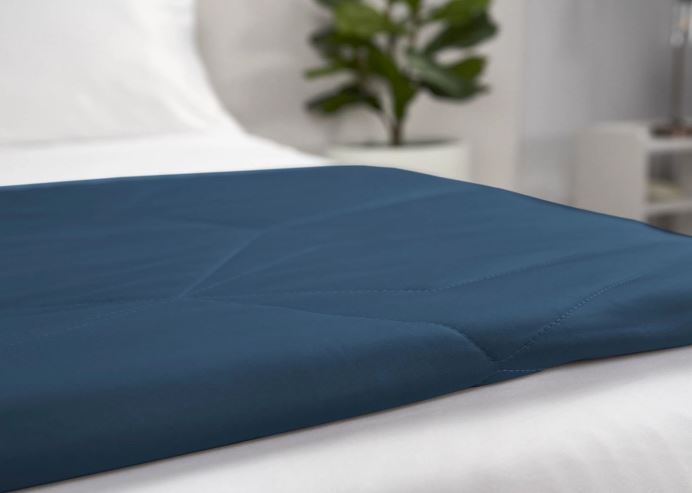 BedGear Cooling Blanket Navy King on white bed with quilted surface HouseOfZazla on Tampa Home & Garden Store