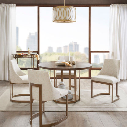 Modern accent dining chairs with beige upholstery around a round dark wood table on Tampa Home & Garden Store