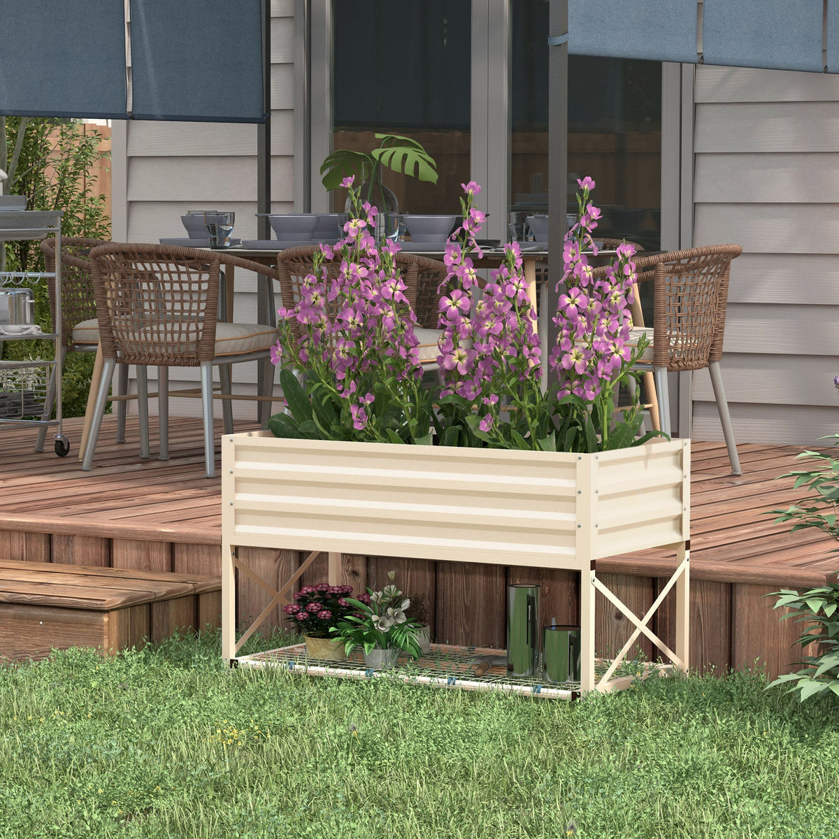 Galvanized steel raised garden bed with bottom shelf in silver on a deck with flowers on Tampa Home & Garden Store