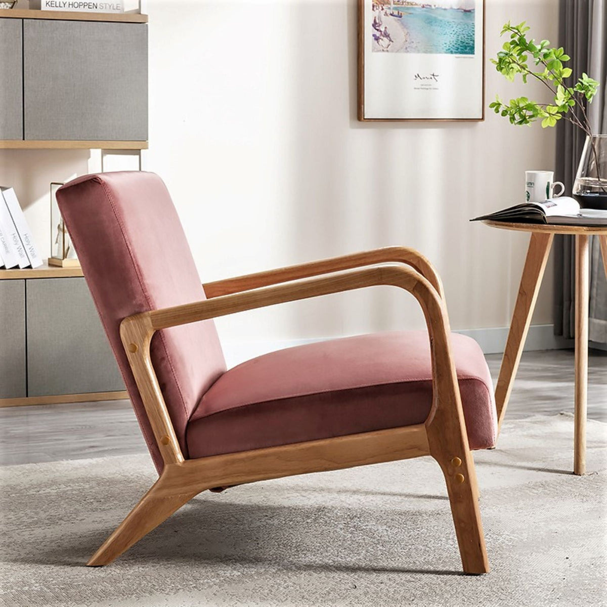 Classic mid-century arm chair with pink upholstery and open wooden frame by HouseOfZazla on Tampa Home & Garden Store