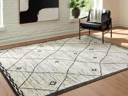 Fenriston rug cream with black geometric grid pattern area rug Unique Piece Furniture on Tampa Home & Garden Store
