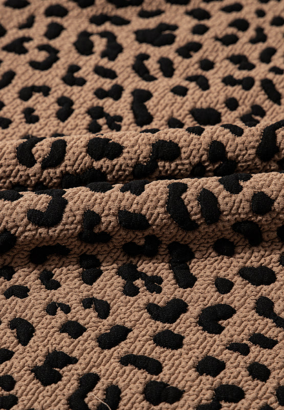 Stevvex leopard print dress fabric tan with black spots textured knit on Tampa Home & Garden Store