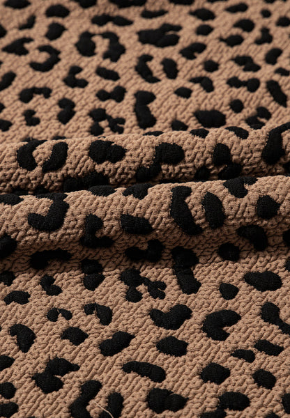 Stevvex leopard print dress fabric tan with black spots textured knit on Tampa Home & Garden Store