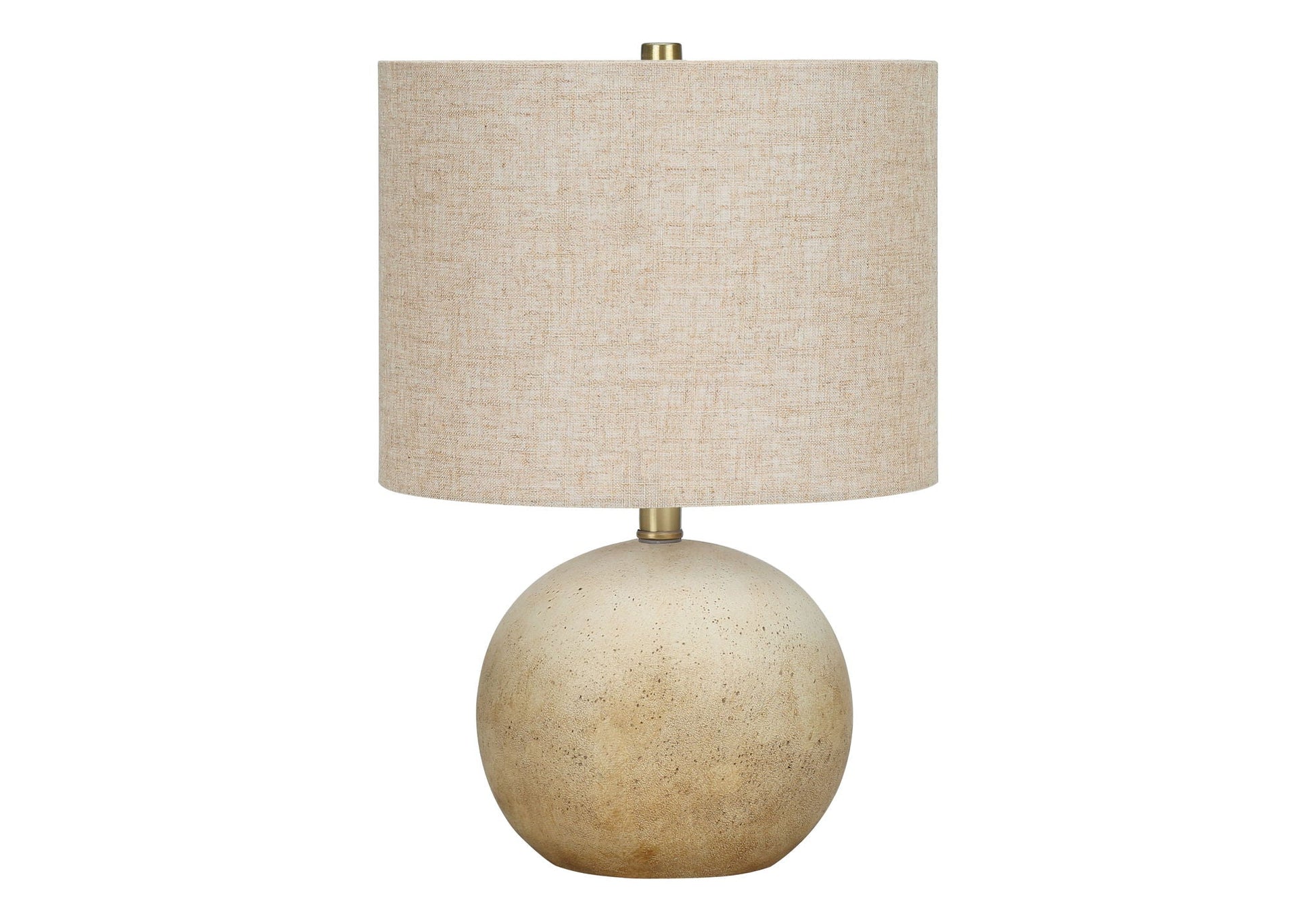 Table lamp with beige linen shade and stacked speckled stone spherical base on Tampa Home & Garden Store