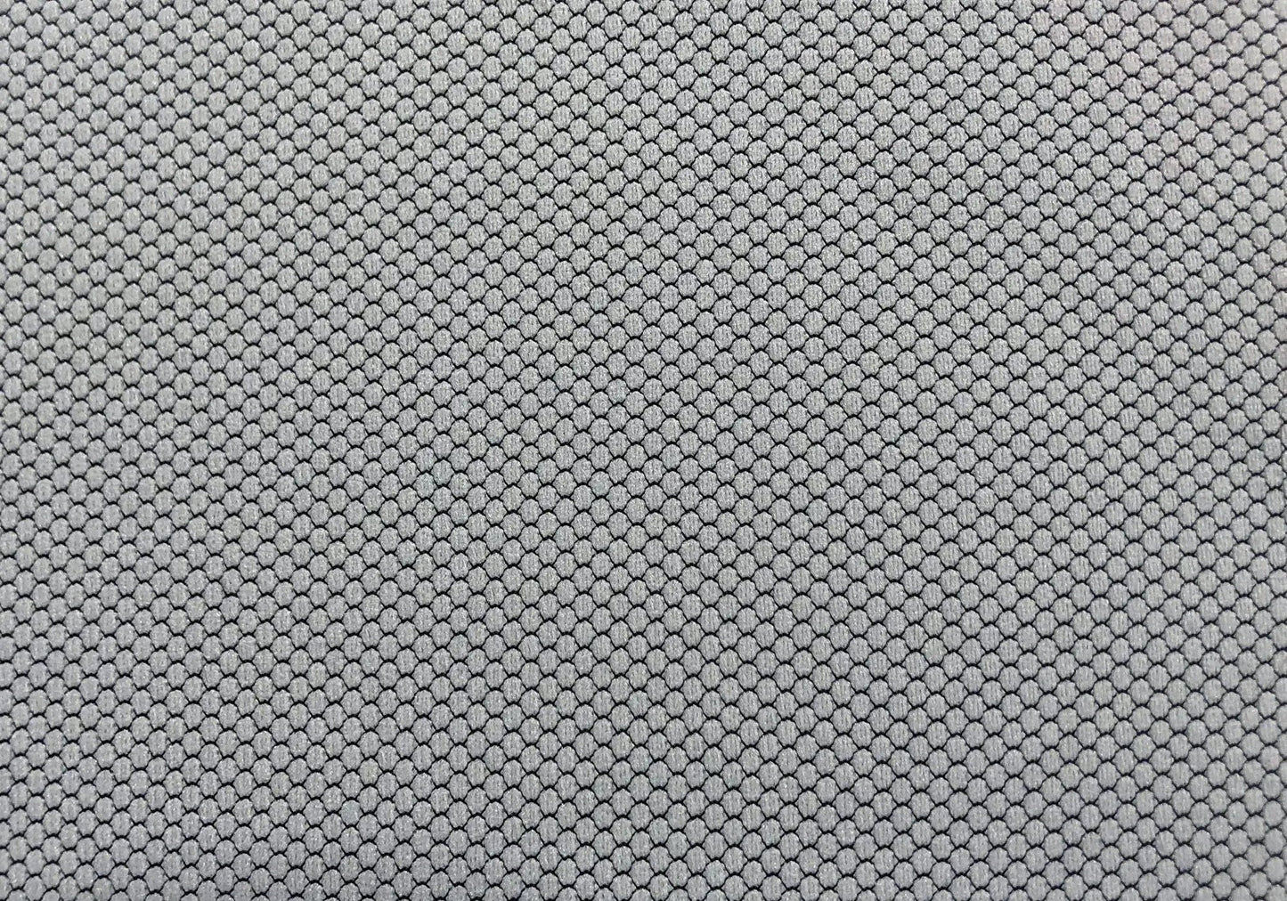 Gray patterned carpet with small rounded loop texture and dense pebble-like design on Tampa Home & Garden Store