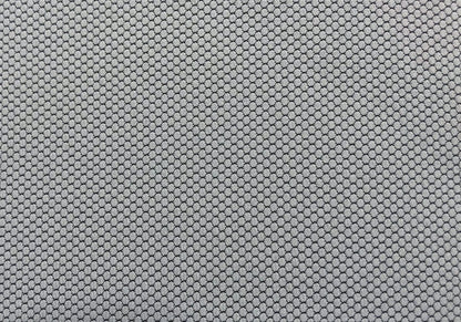 Gray patterned carpet with small rounded loop texture and dense pebble-like design on Tampa Home & Garden Store