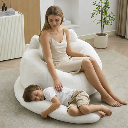 Cat shaped bean bag sofa in white plush fabric with long tail; kids lounge on it on Tampa Home & Garden Store