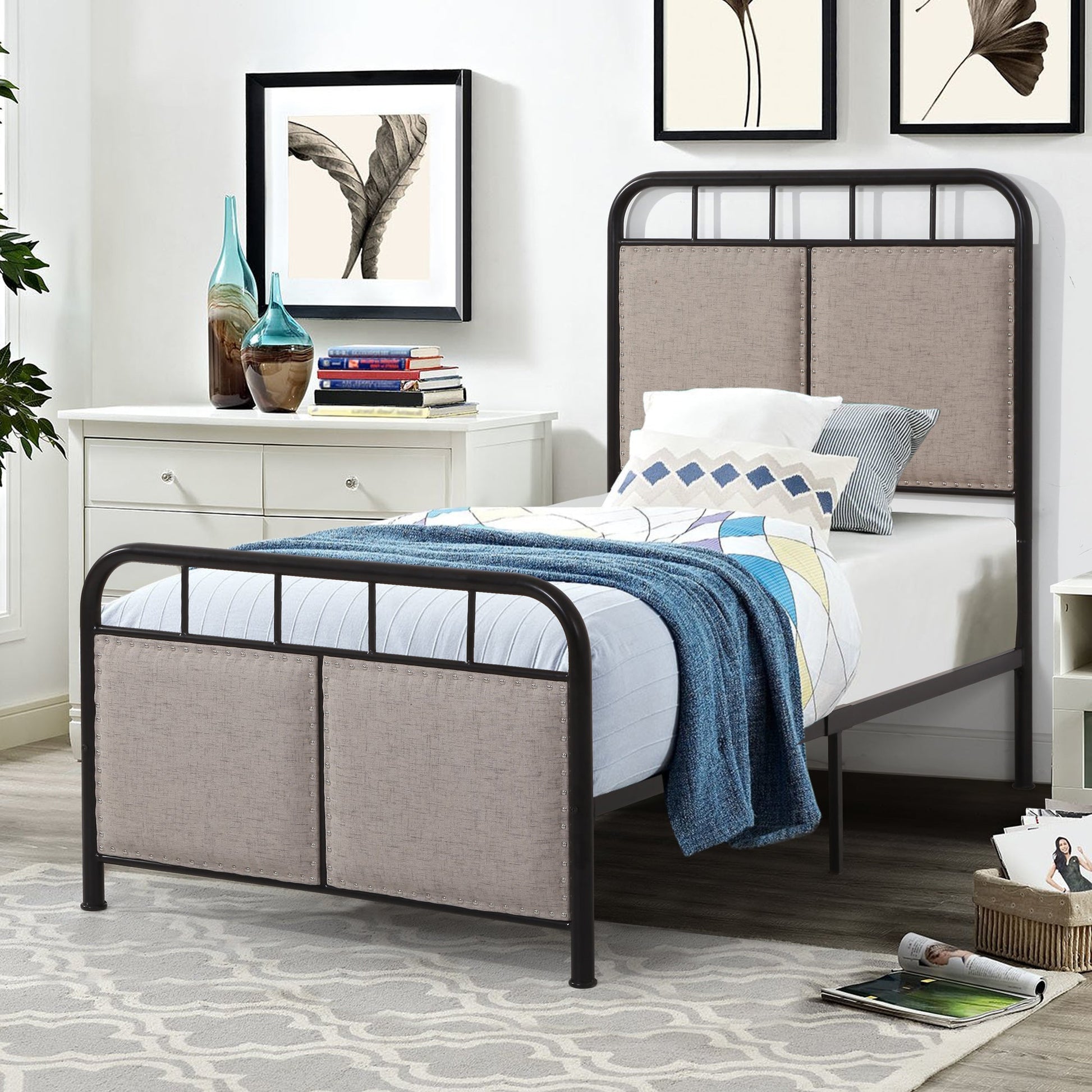 Twin size linen upholstered platform bed frame with beige fabric headboard and footboard, black metal frame in a modern bedroom on Tampa Home & Garden Store