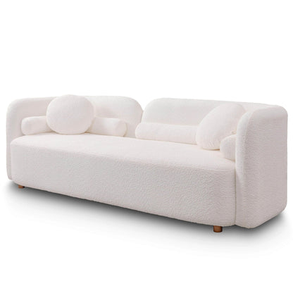Modern Three Seater Couch And Fluffy Pillows