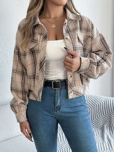 Womens beige plaid button-up jacket, cozy flannel style worn over white top with blue jeans on Tampa Home & Garden Store