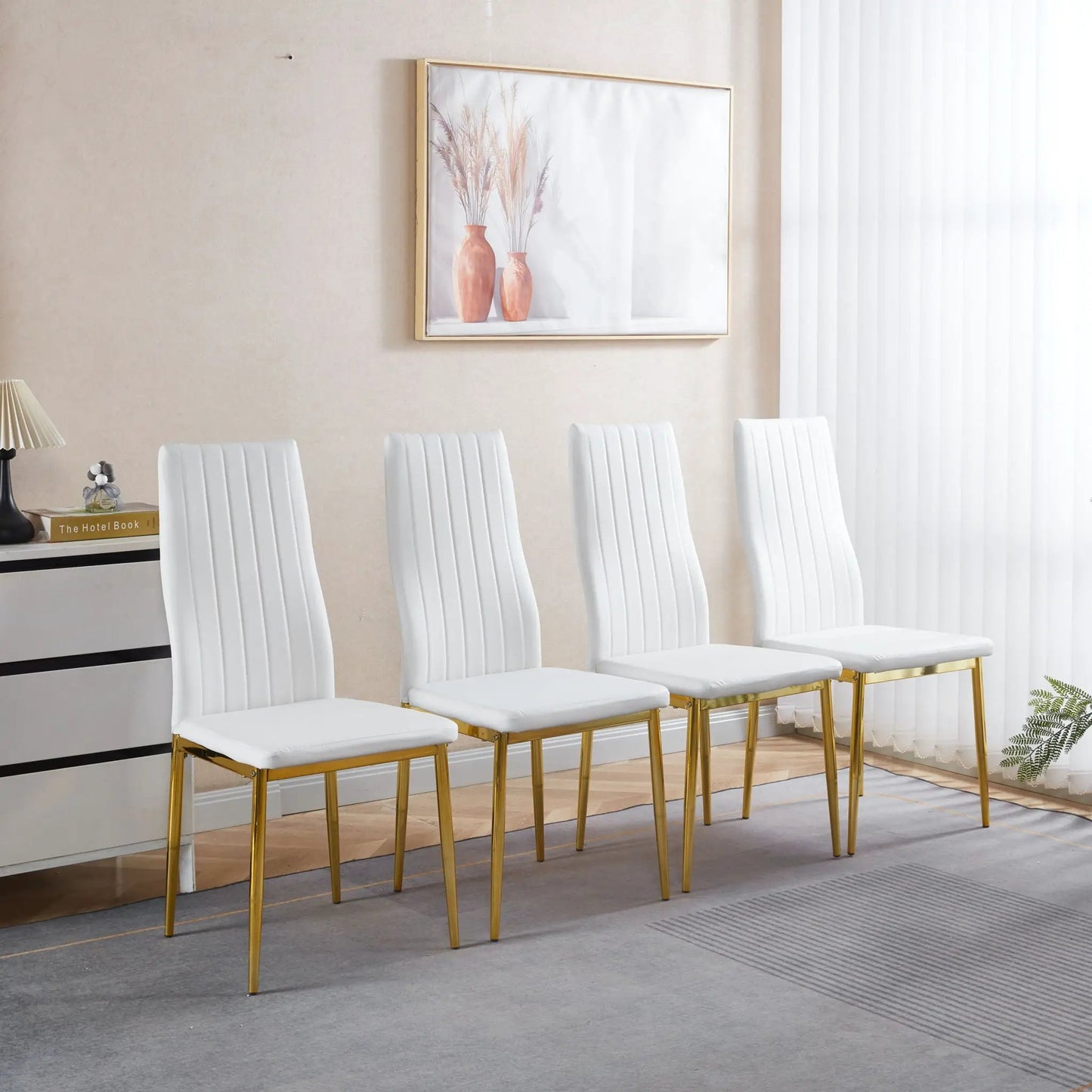 Elegant Legs Dining Chair set of 4 in white upholstery with gold metal legs on Tampa Home & Garden Store