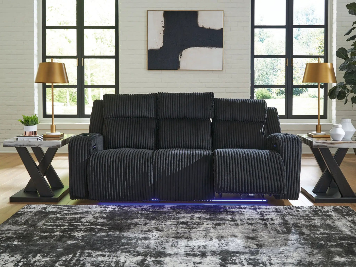 Forest Lake power reclining sofa with adjustable headrests in dark ribbed fabric on Tampa Home & Garden Store
