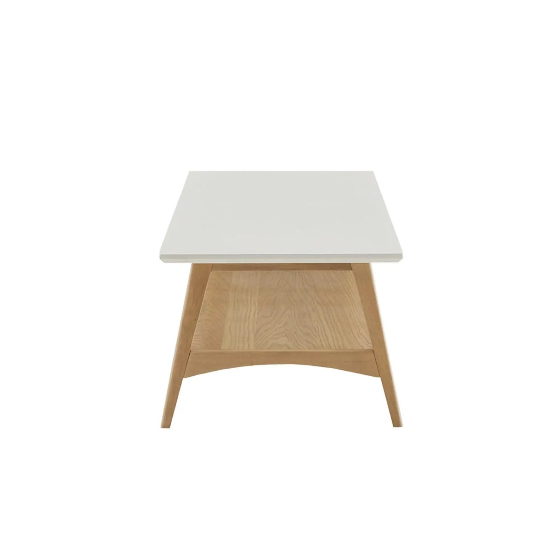 Modern coffee table with white tabletop and natural oak angled legs, open storage shelf on Tampa Home & Garden Store