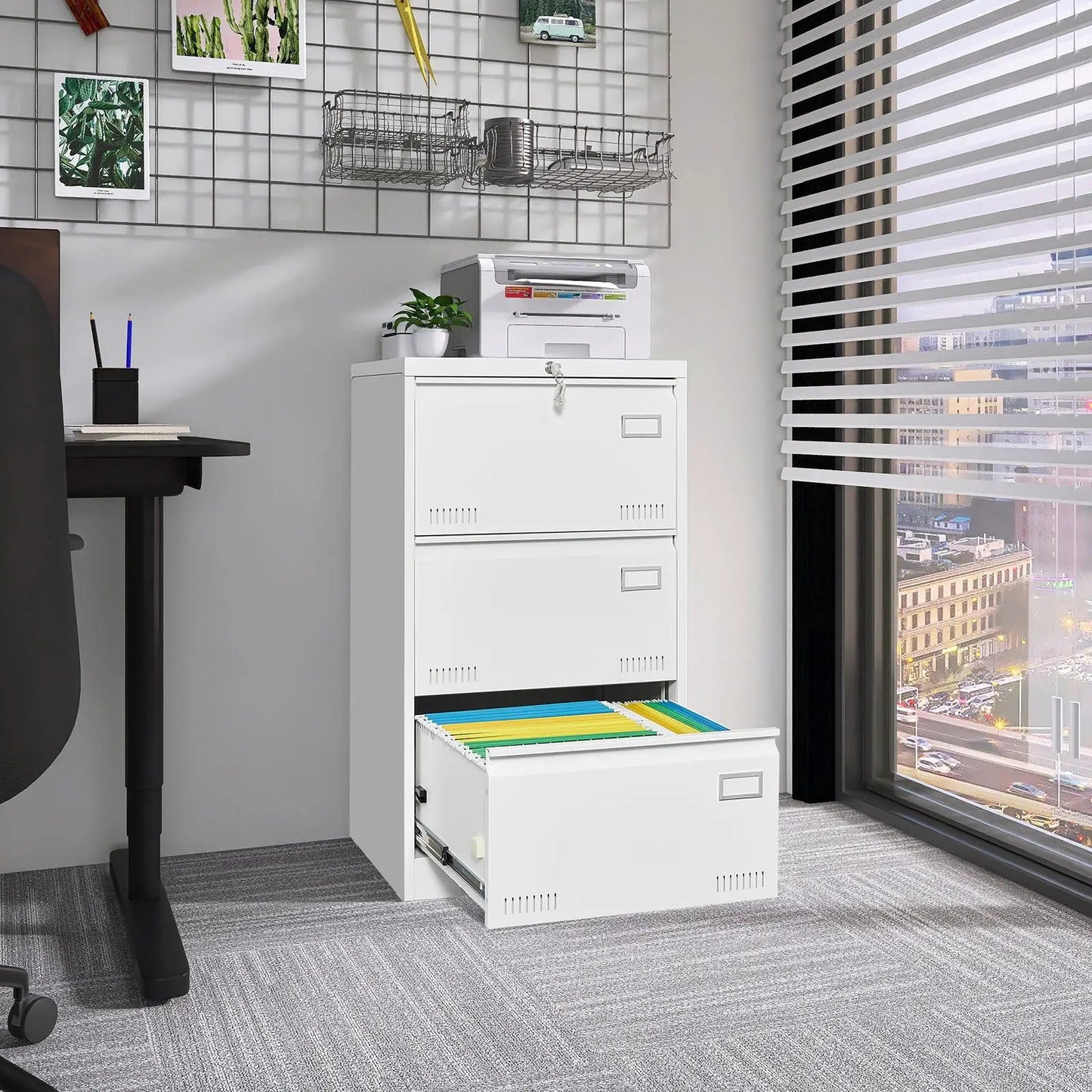 Three-drawer locking metal filing cabinet, white finish with bottom drawer open showing color folders on Tampa Home & Garden Store