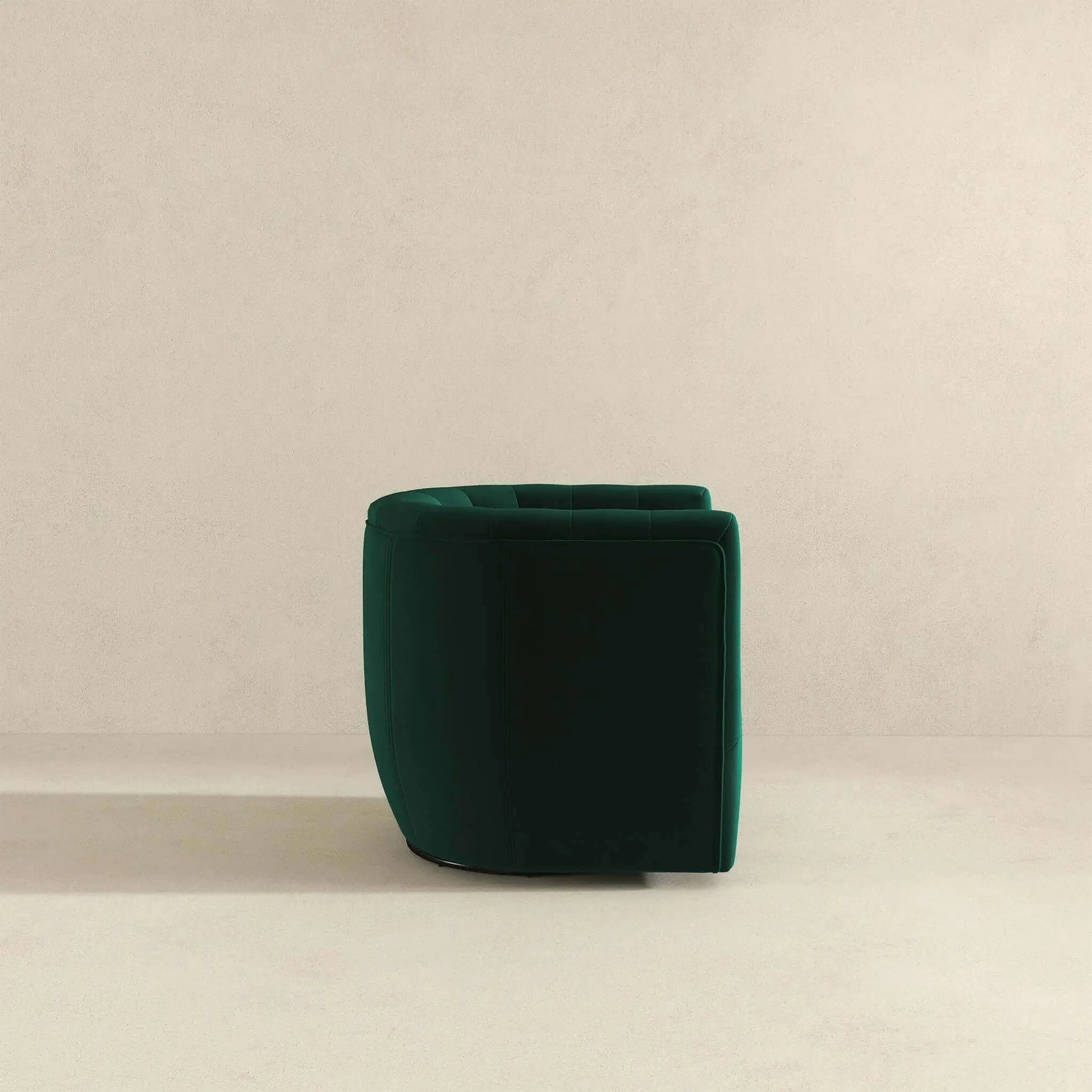 Delaney ergonomic swivel chair in emerald green velvet with tufted back on Tampa Home & Garden Store