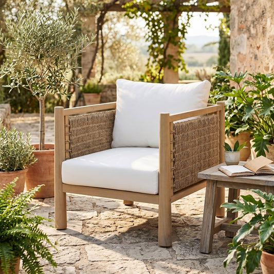 Outdoor Acacia Wood Patio Chair with white cushion and woven rope sides in a sunlit garden on Tampa Home & Garden Store
