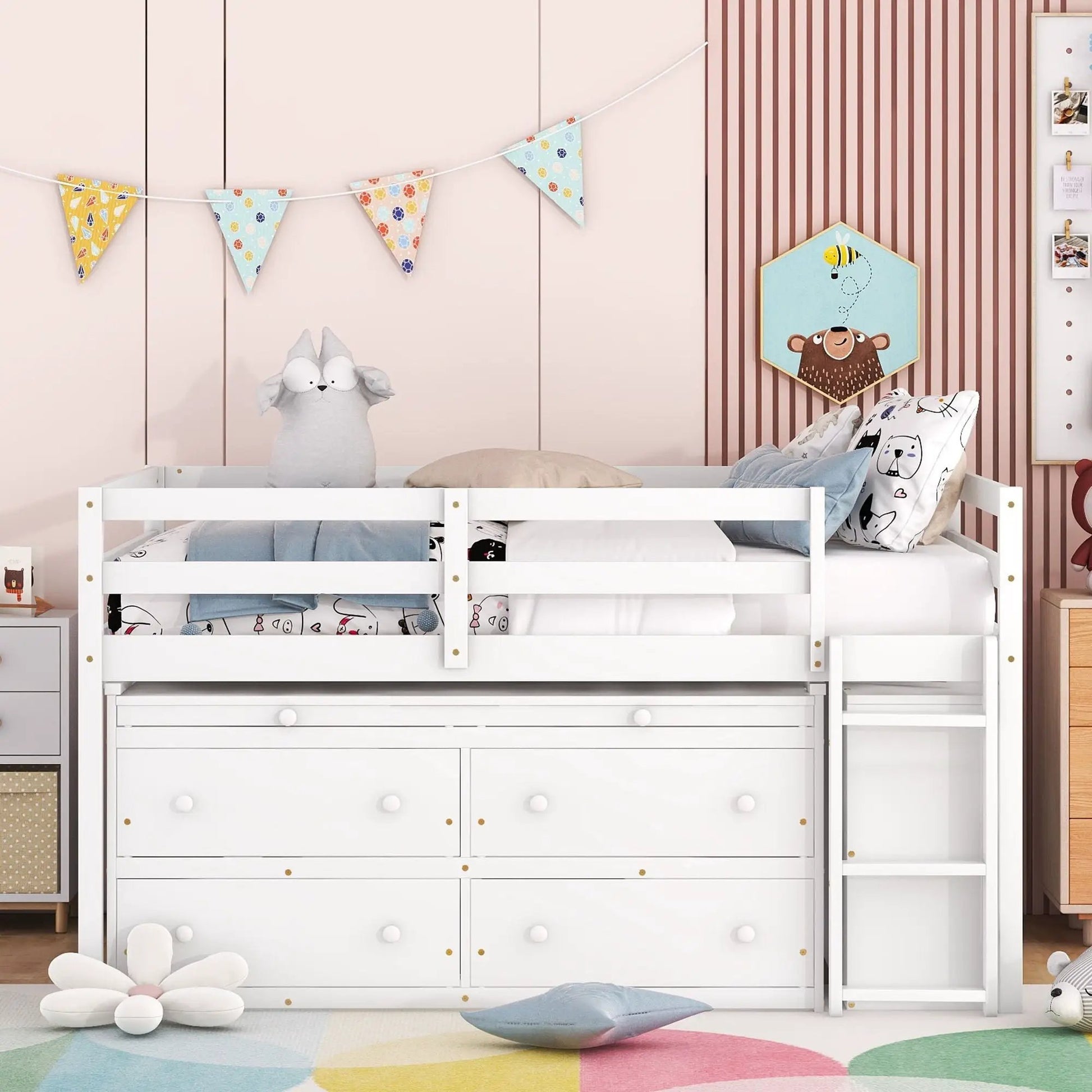 Loft bed with white finish and four drawers under frame in a pink kids room with bunting on Tampa Home & Garden Store