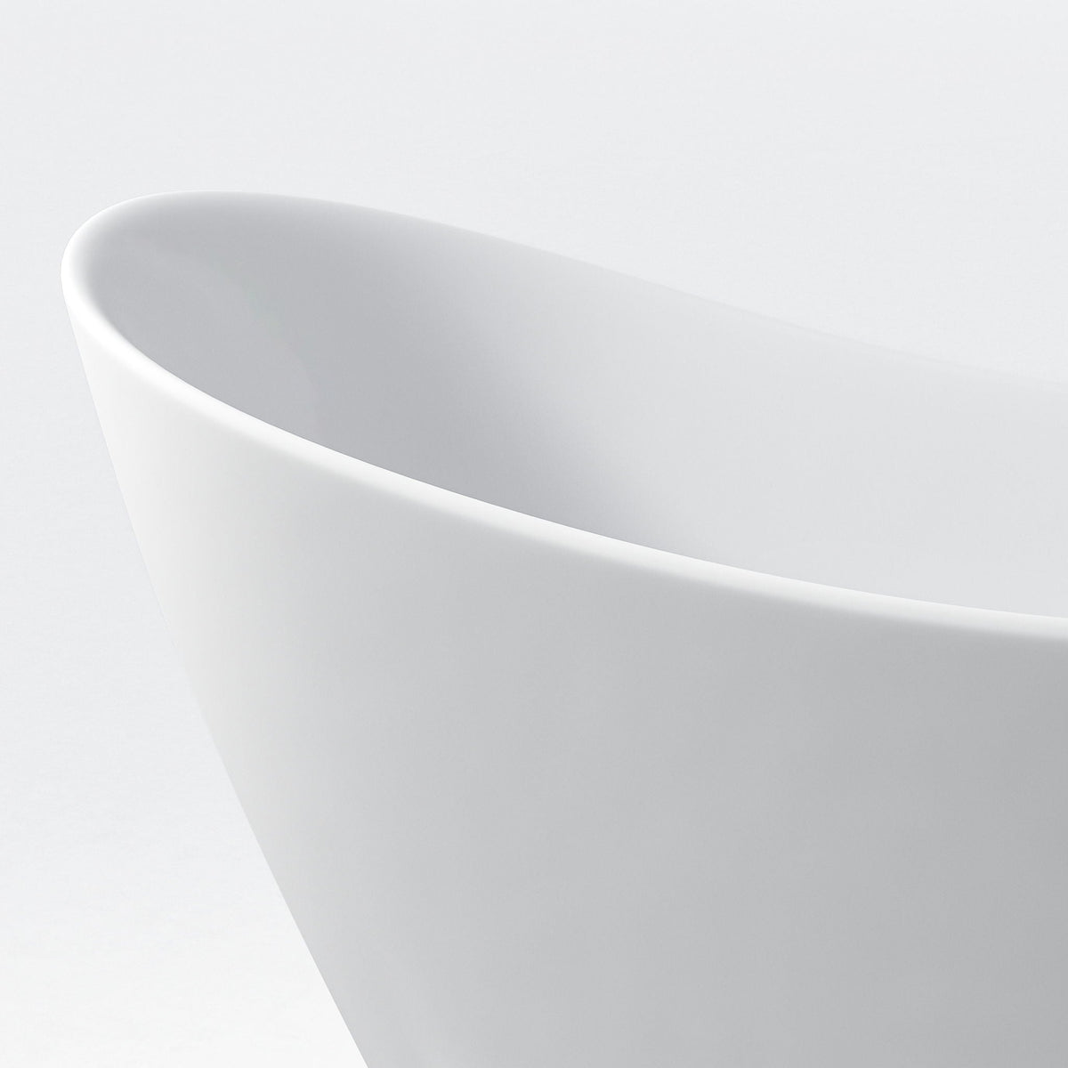 Freestanding white tub by HouseOfZazla with ergonomic curve and overflow on Tampa Home & Garden Store