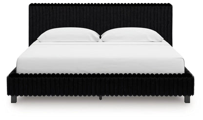 Zuraleus upholstered bed by Unique Piece Furniture with black faux fur frame and headboard on Tampa Home & Garden Store