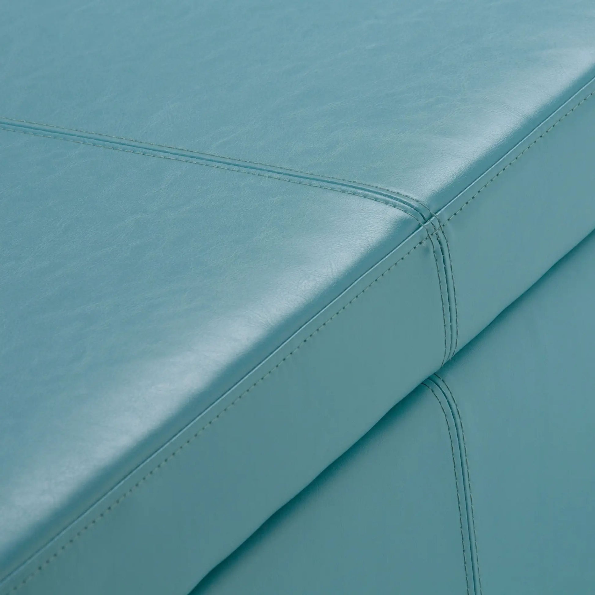 Avalon Multifunctional Storage Ottoman Bench in teal leather with top-stitch seam detail on Tampa Home & Garden Store