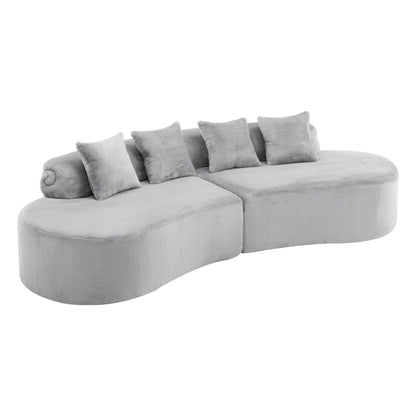 Modern Curved Sofa and the Soft Linen Pillows