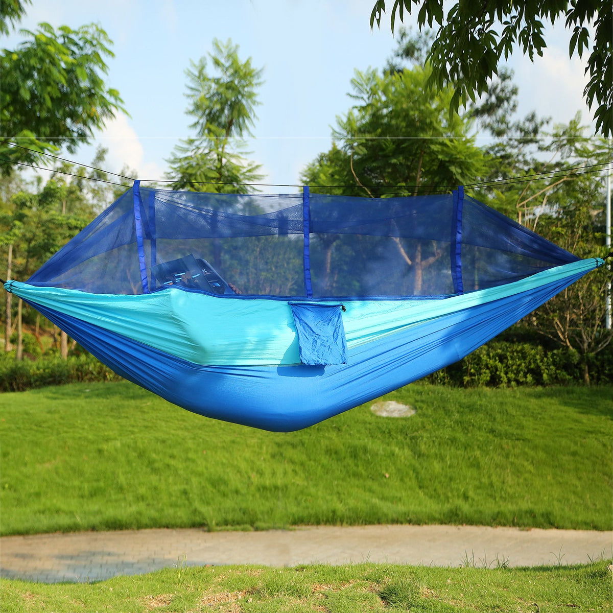 Blue two-person camping hammock with mosquito net and carry bag, nylon material on Tampa Home & Garden Store