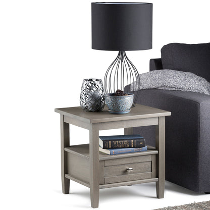 Warm Shaker coffee table with drawer and shelf in gray wood, topped with a shade lamp on Tampa Home & Garden Store