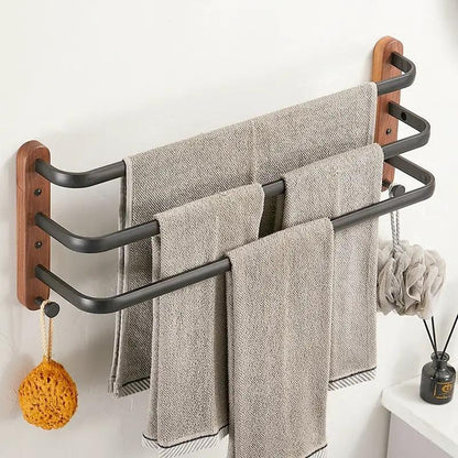 Solid wood towel rack wall hanging multi-bar with dark metal arms and wood mounts on Tampa Home & Garden Store