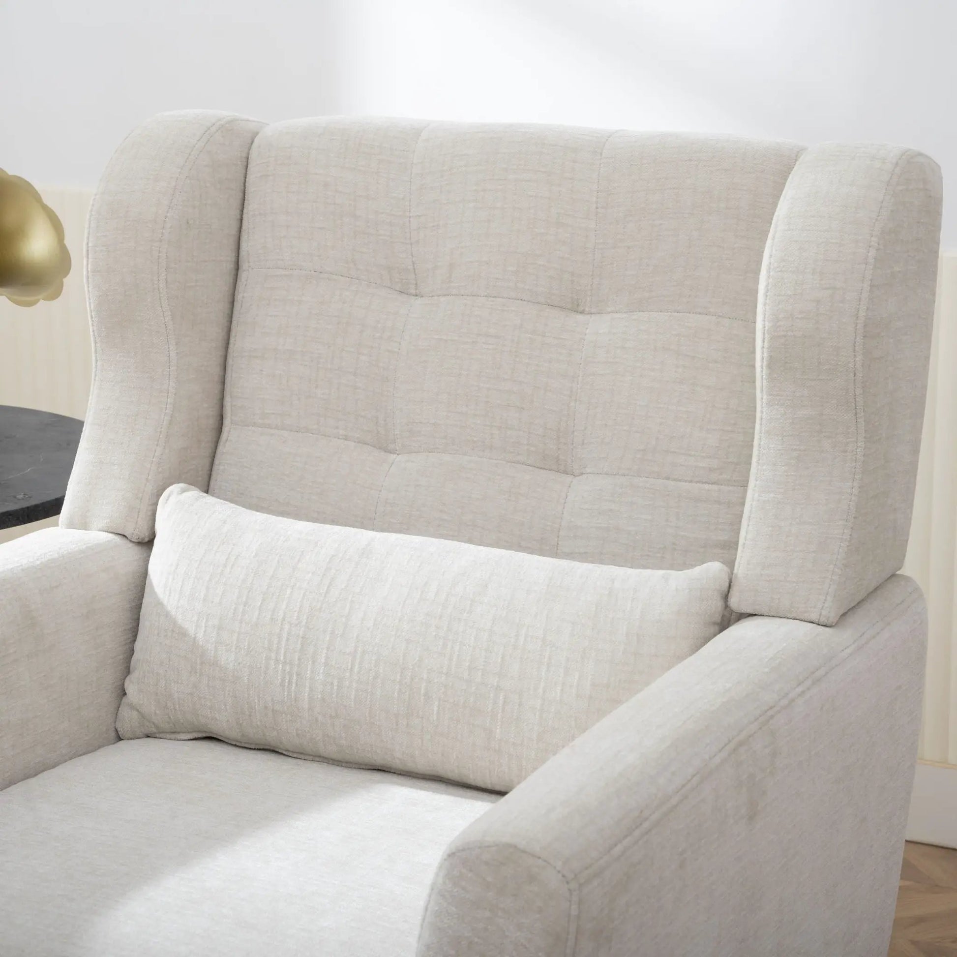 Mid-century modern accent chair in light beige fabric with foam-filled cushions and tufted back on Tampa Home & Garden Store