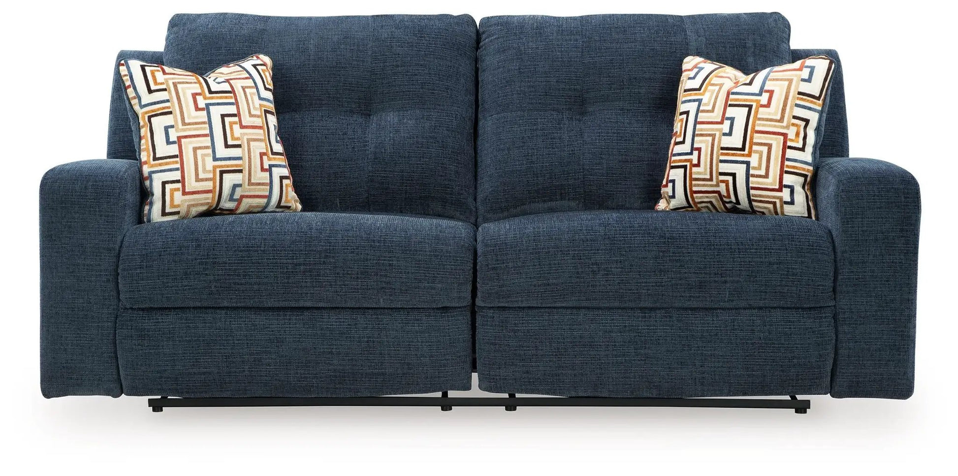 Danum 2-seat reclining sofa in navy blue textured fabric with geometric pattern throw pillows on Tampa Home & Garden Store