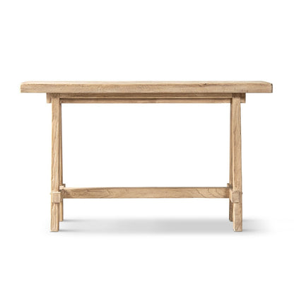 Trestle coffee table in solid reclaimed elm with a light brown finish on Tampa Home & Garden Store