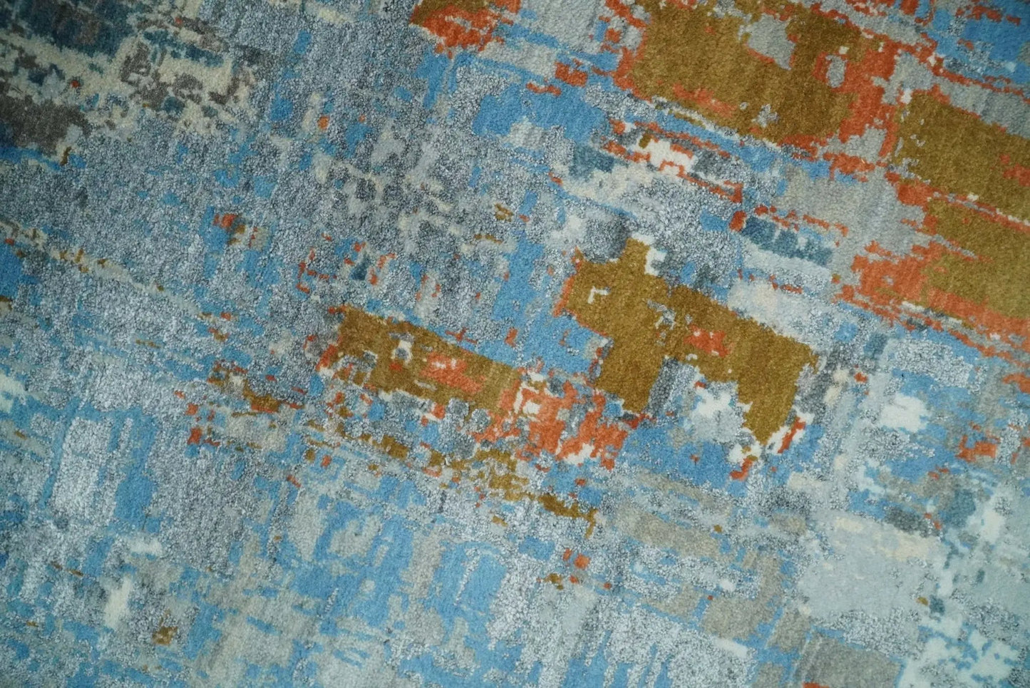 Beige and blue hand knotted wool and silk area rug with abstract pattern 8x10 on Tampa Home & Garden Store