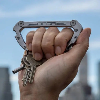 GPCA Carabiner PRO EDC multi-tool clip in metallic gray aluminum held with several keys on Tampa Home & Garden Store