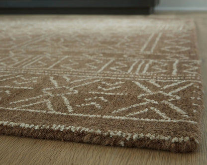 Merrittman rug, brown area rug with cream geometric lattice pattern and plush rolled edge on Tampa Home & Garden Store