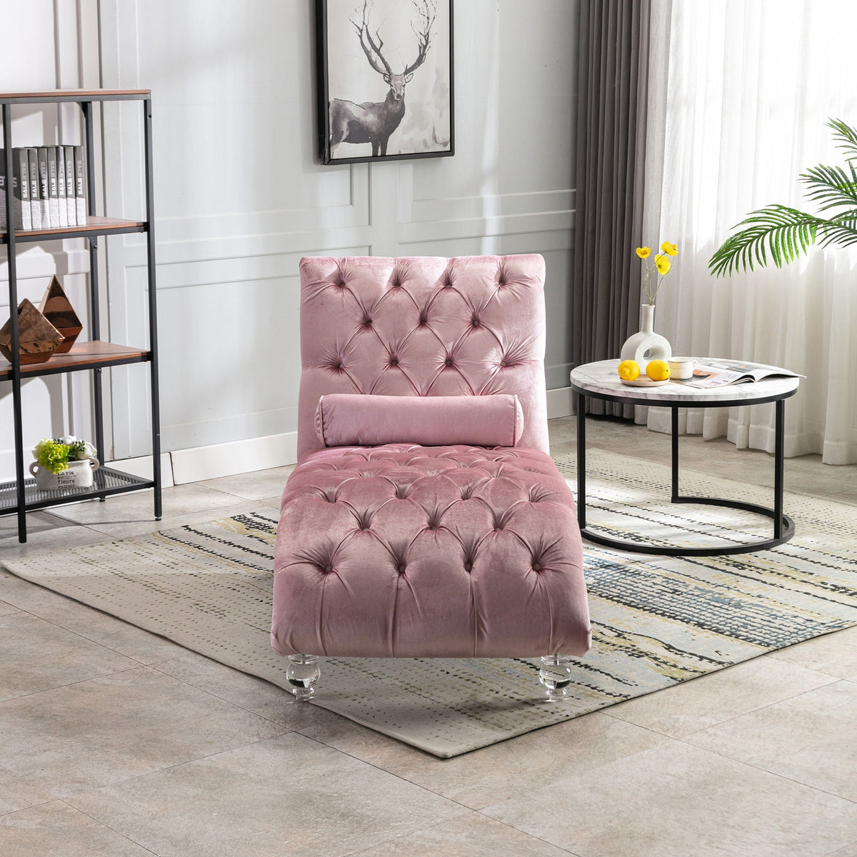 Pink velvet button-tufted chaise with pillow and ottoman in a modern living room on Tampa Home & Garden Store