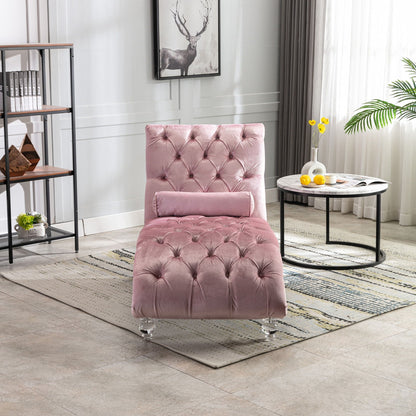Pink velvet button-tufted chaise with pillow and ottoman in a modern living room on Tampa Home & Garden Store