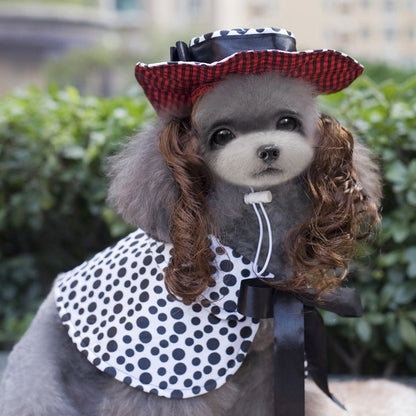 Pet Zen Christmas dog outfit: gray poodle in black-white polka bib with red plaid hat on Tampa Home & Garden Store
