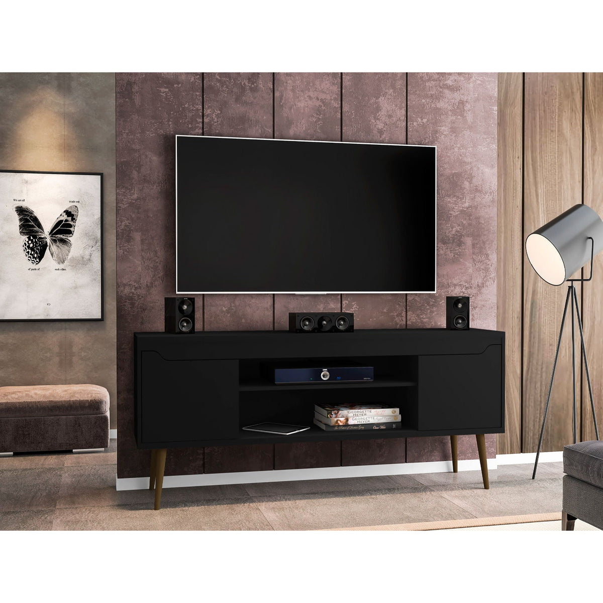 HouseOfZazla black mid-century TV stand with solid wood splayed legs, TV and speakers on Tampa Home & Garden Store