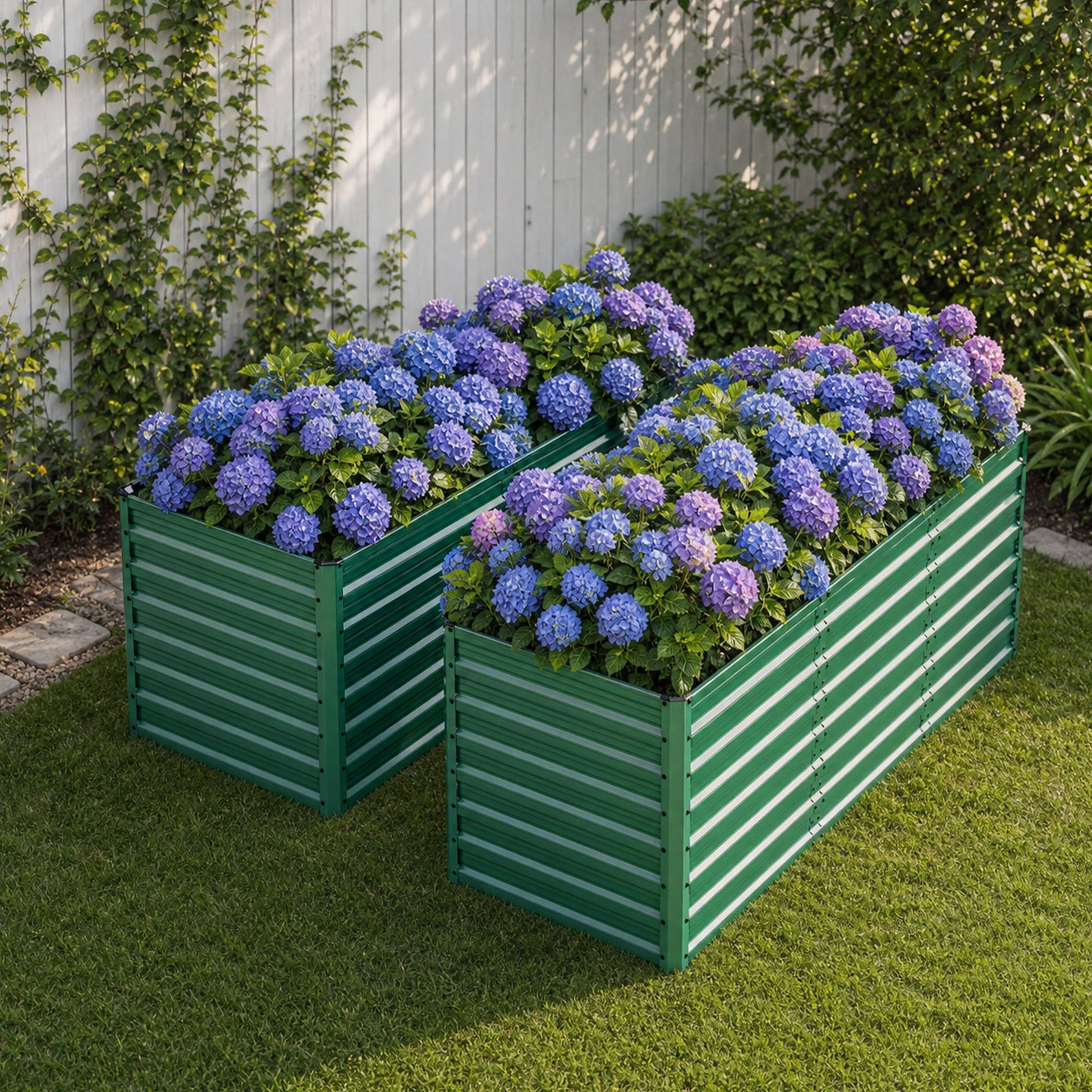 2-pack green metal raised garden beds filled with blue hydrangea blooms on Tampa Home & Garden Store