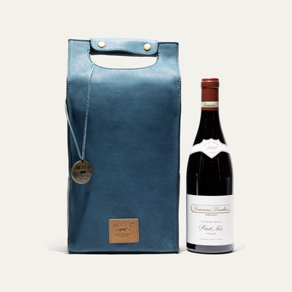 Double Leather Wine Case blue leather wine carrier with brass snaps beside wine bottle on Tampa Home & Garden Store