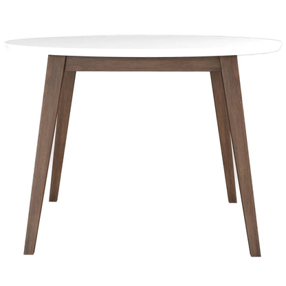 Paloma dining table with white oval top and dark wood angled legs on Tampa Home & Garden Store