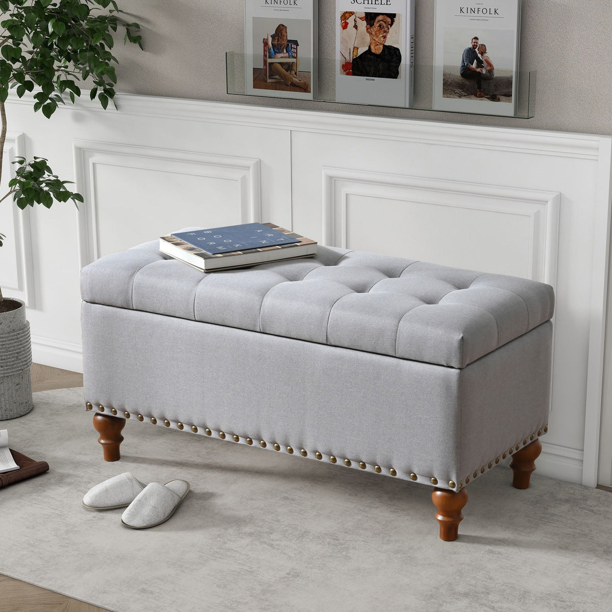 Upholstered storage ottoman in gray fabric with tufted lid and rivet trim HouseOfZazla on Tampa Home & Garden Store