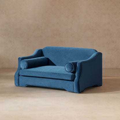Paloma 35.5in Dog Sofa Bed, Medium satin blue upholstery with two bolster pillows on Tampa Home & Garden Store