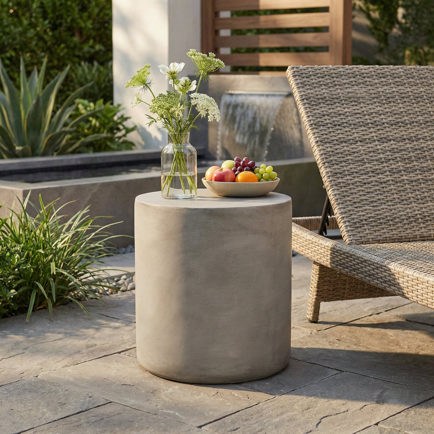 Outdoor Lightweight Concrete Side Table, Light Gray on a patio beside a wicker chair on Tampa Home & Garden Store