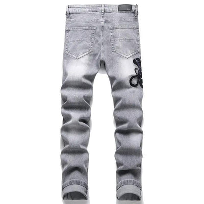 Men's gray denim jeans with cobra embroidery on right thigh and faded patches FLIPSTYLEZLLC on Tampa Home & Garden Store