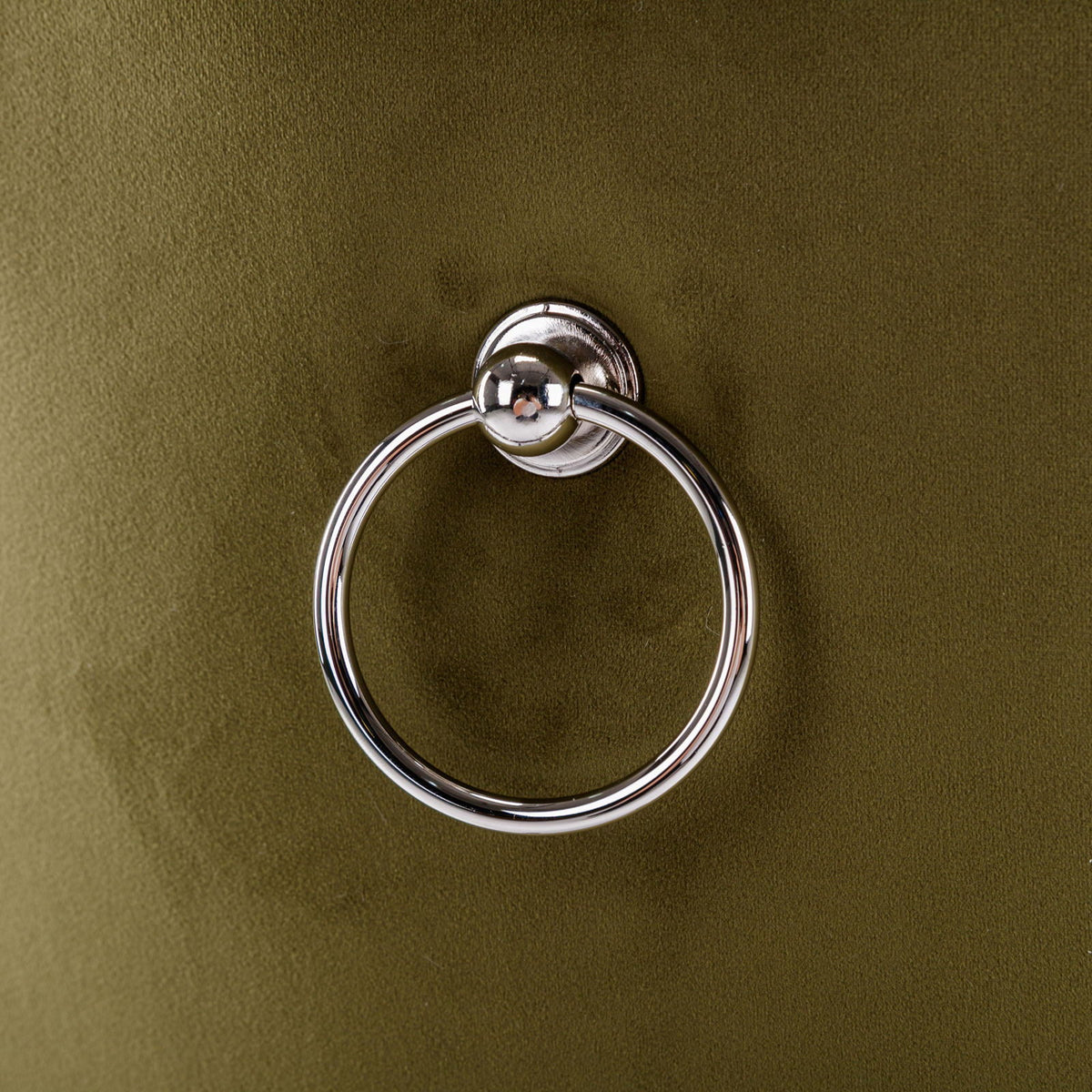 Chrome towel ring mounted on olive green velvet upholstery by HouseOfZazla on Tampa Home & Garden Store