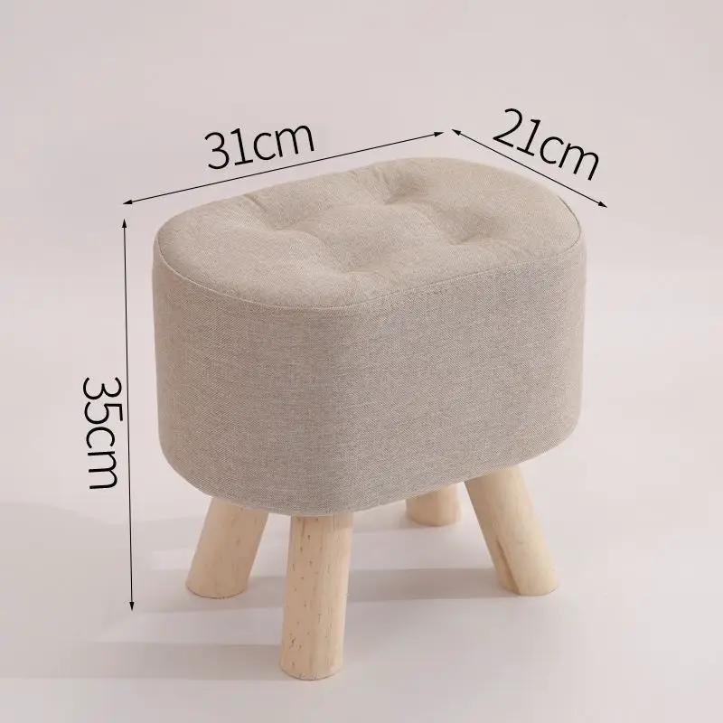 Nordic solid wood fabric stool with light gray upholstery and natural wood legs on Tampa Home & Garden Store