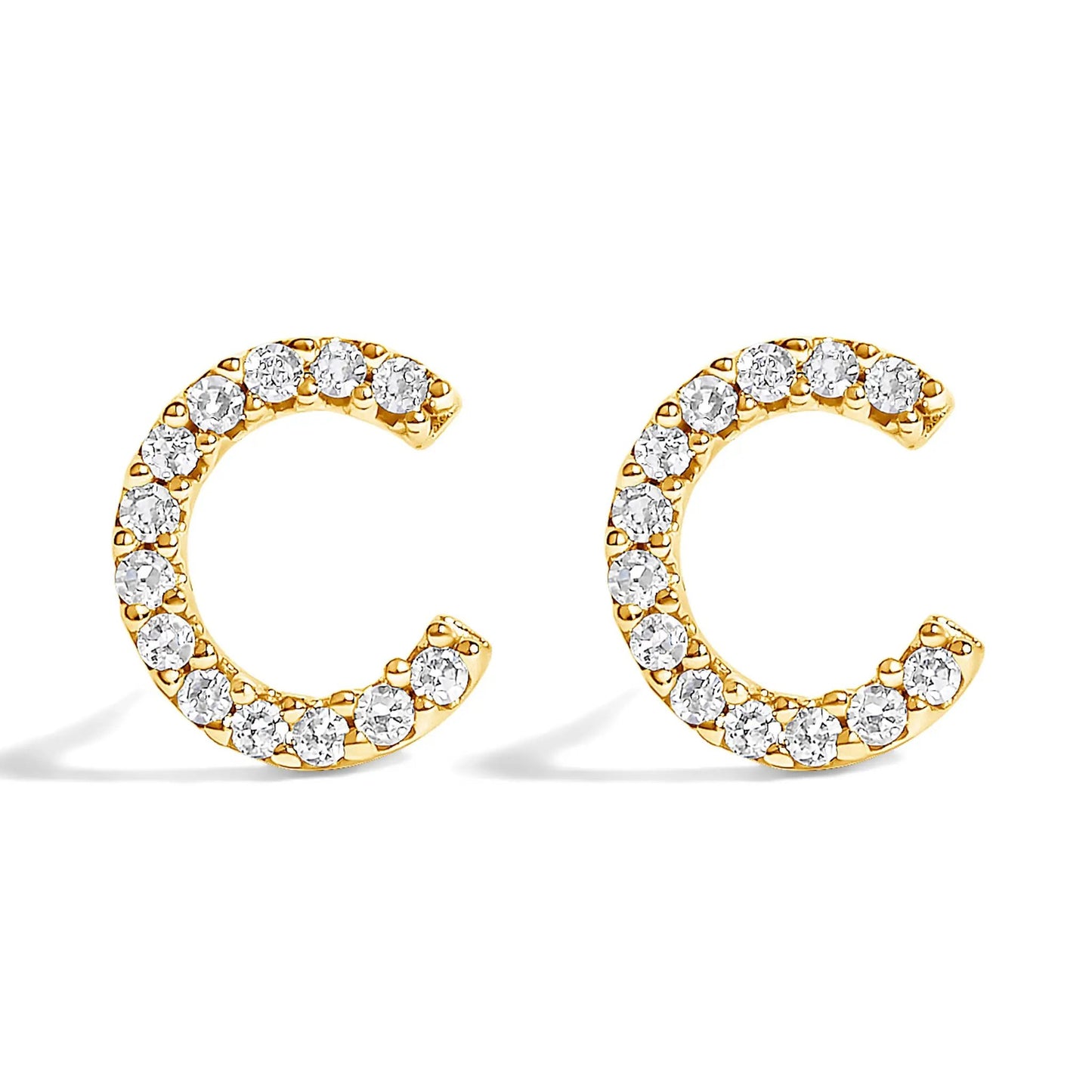 Gold-tone diamond-studded hoop earrings with pavé crystals along curved band on Tampa Home & Garden Store