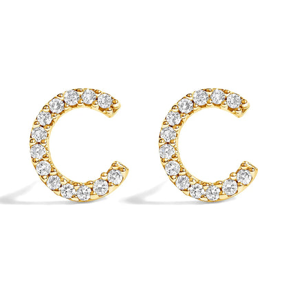 Gold-tone diamond-studded hoop earrings with pavé crystals along curved band on Tampa Home & Garden Store