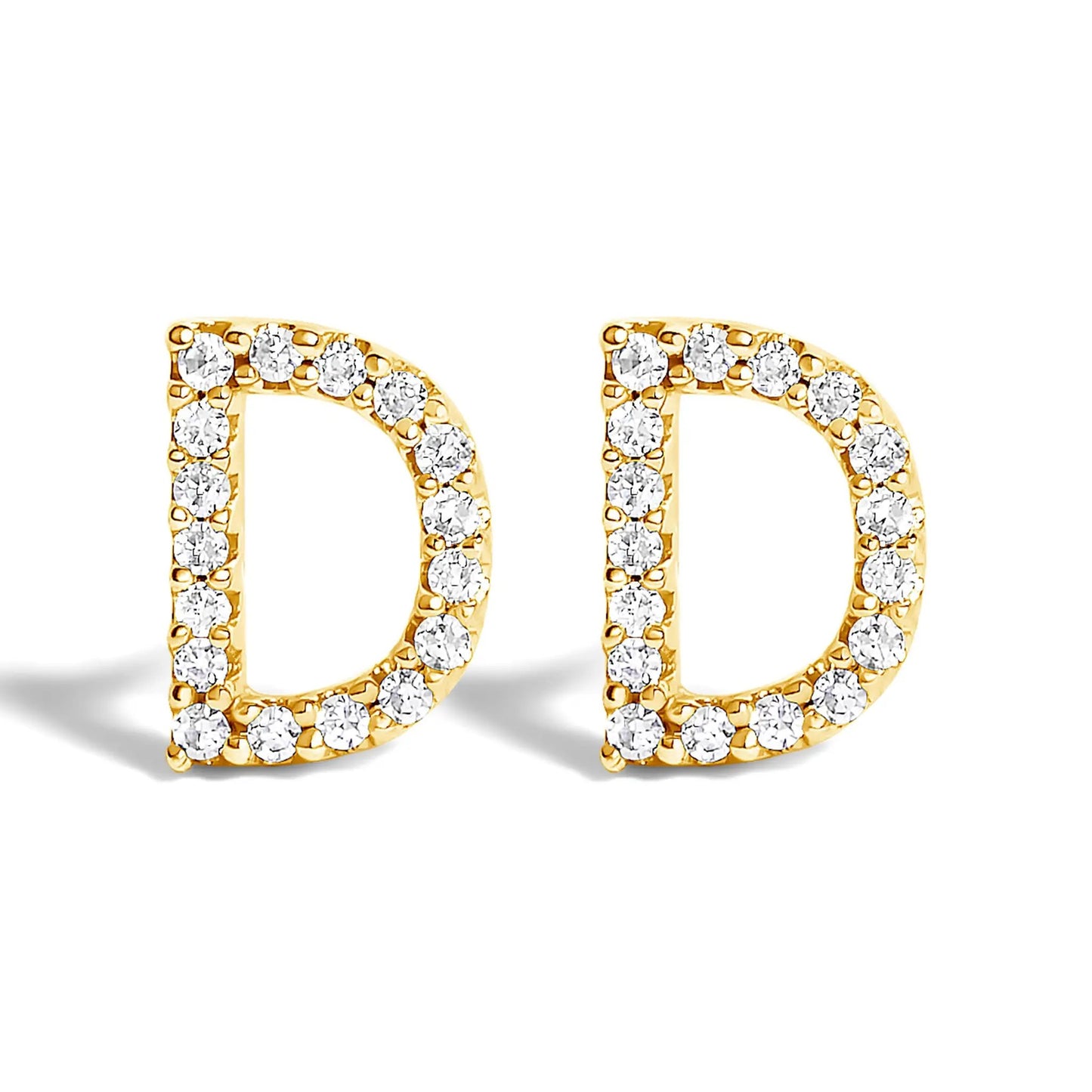 Gold hoop earrings adorned with pavé diamonds along the outer edge on Tampa Home & Garden Store